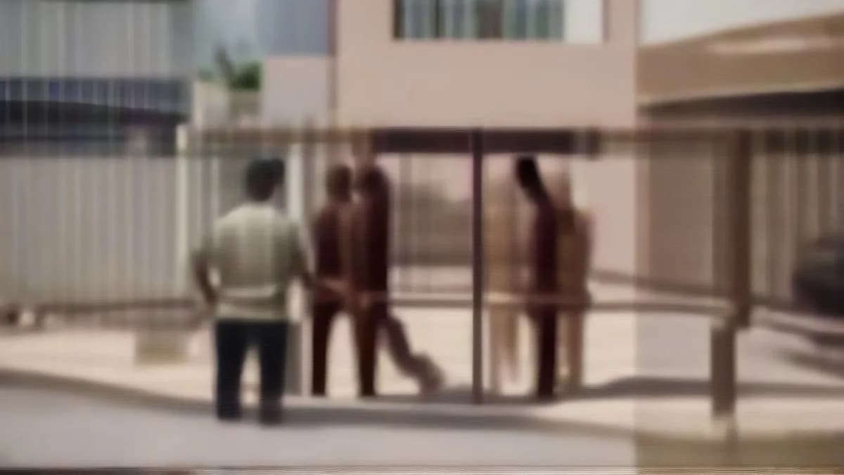 Police officers gathered outside a station in Tamil Nadu during an active investigation.
