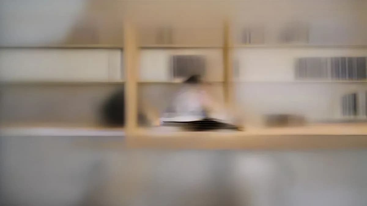 A student preparing for engineering entrance examinations at a desk.