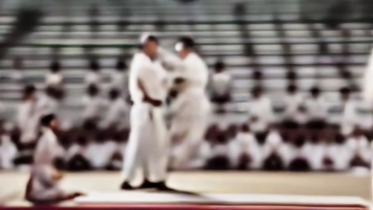 Manipur Chief Minister receiving Grand Master Taekwondo distinction at indoor stadium